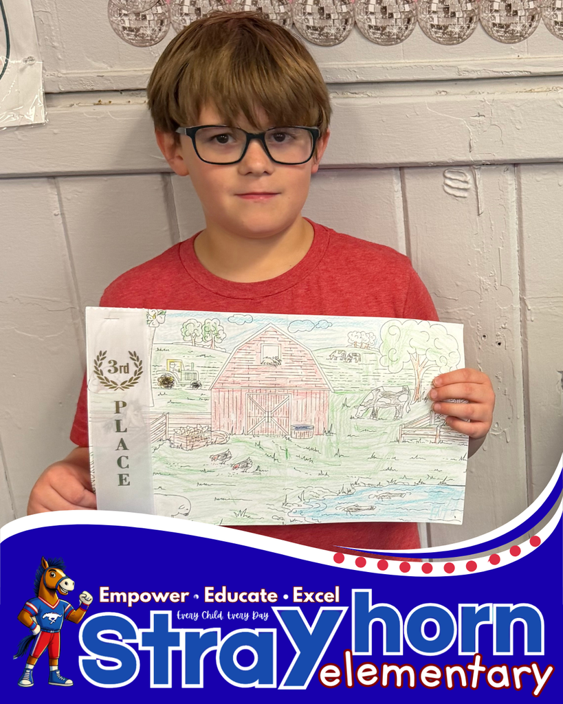 student smiling at camera with a color sheet