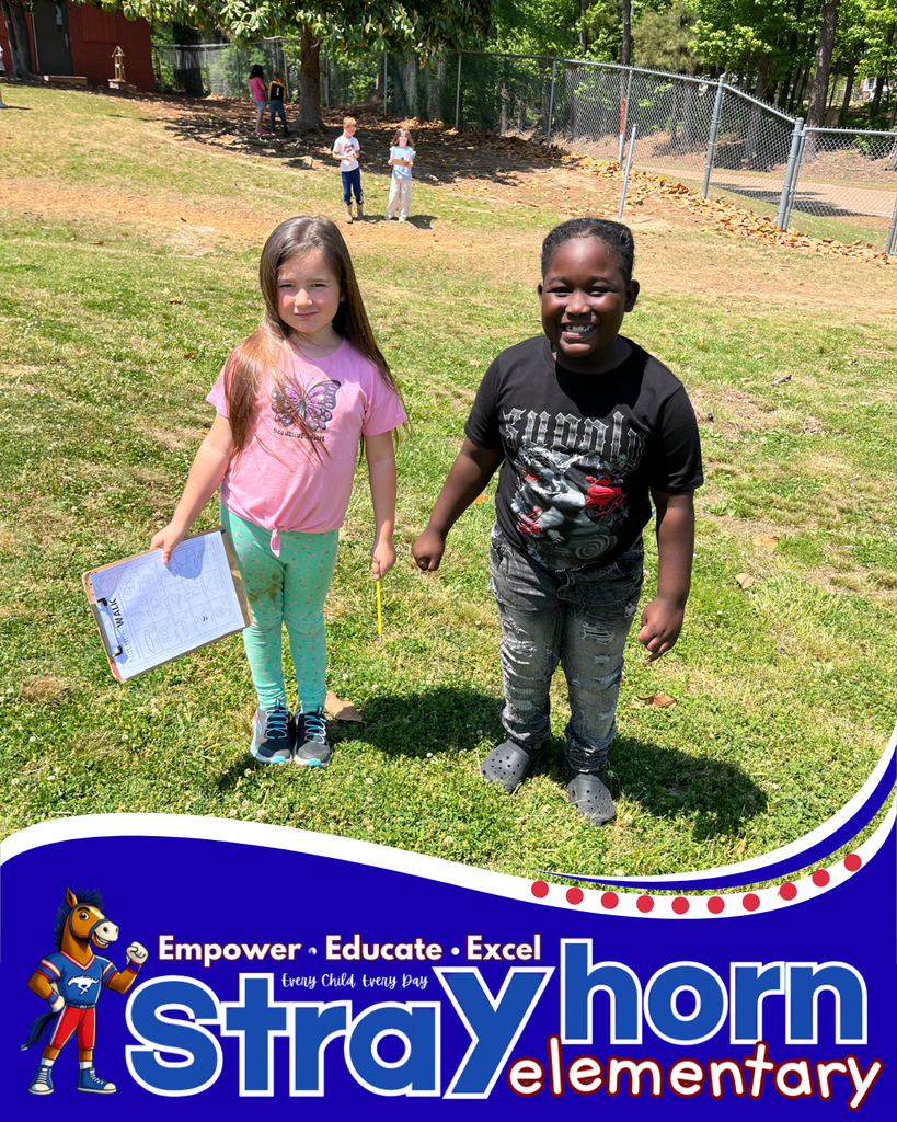 students outside with clipboards