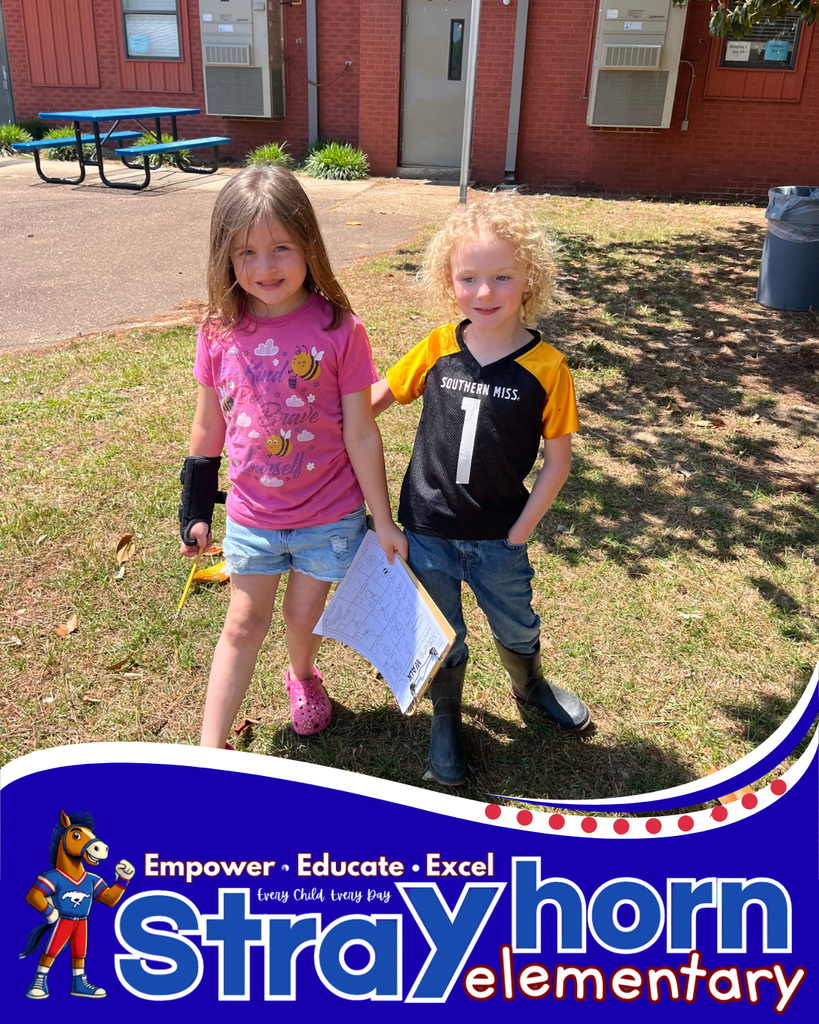 students outside with clipboards