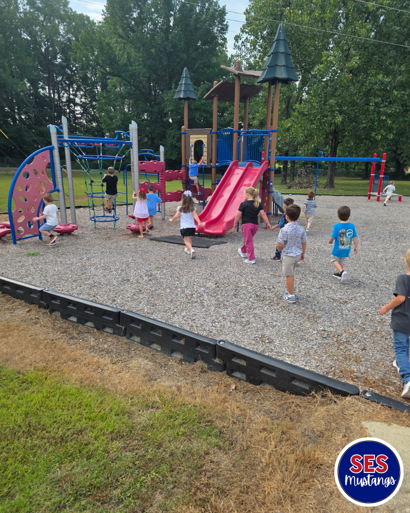 students running on playground