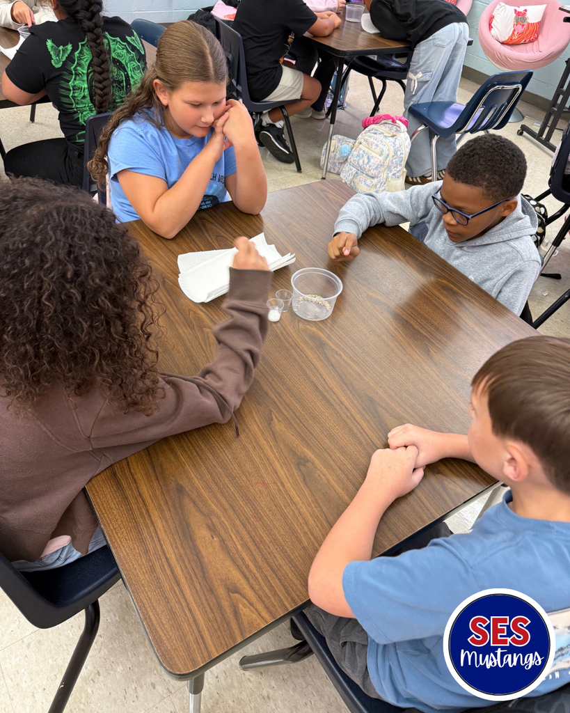 students in group at a table