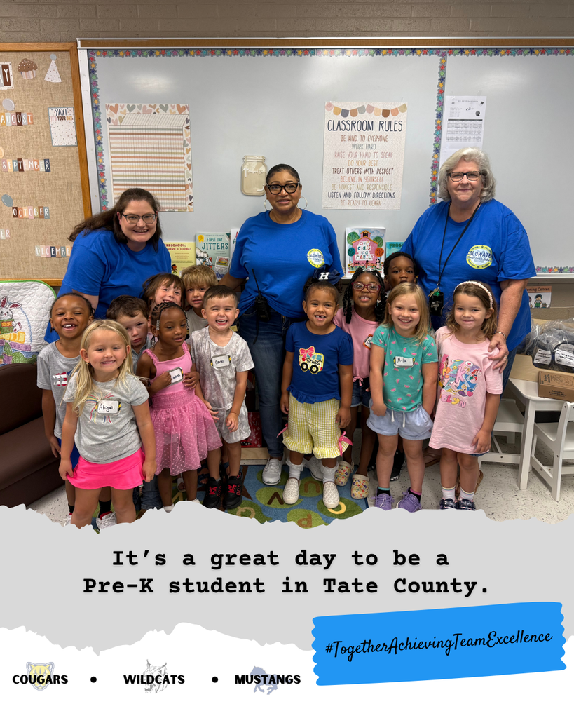 SMiling pre-k students.
