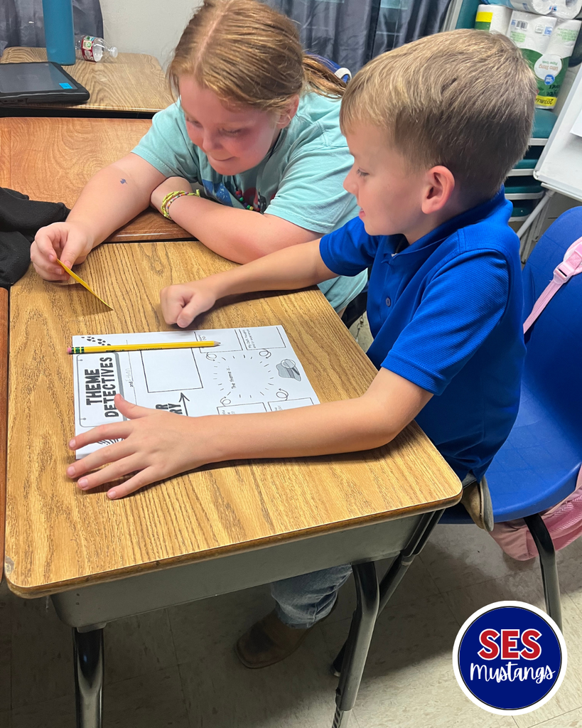 students writing in groups