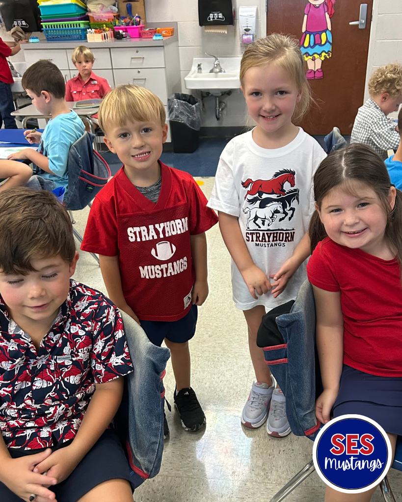students smiling at camera