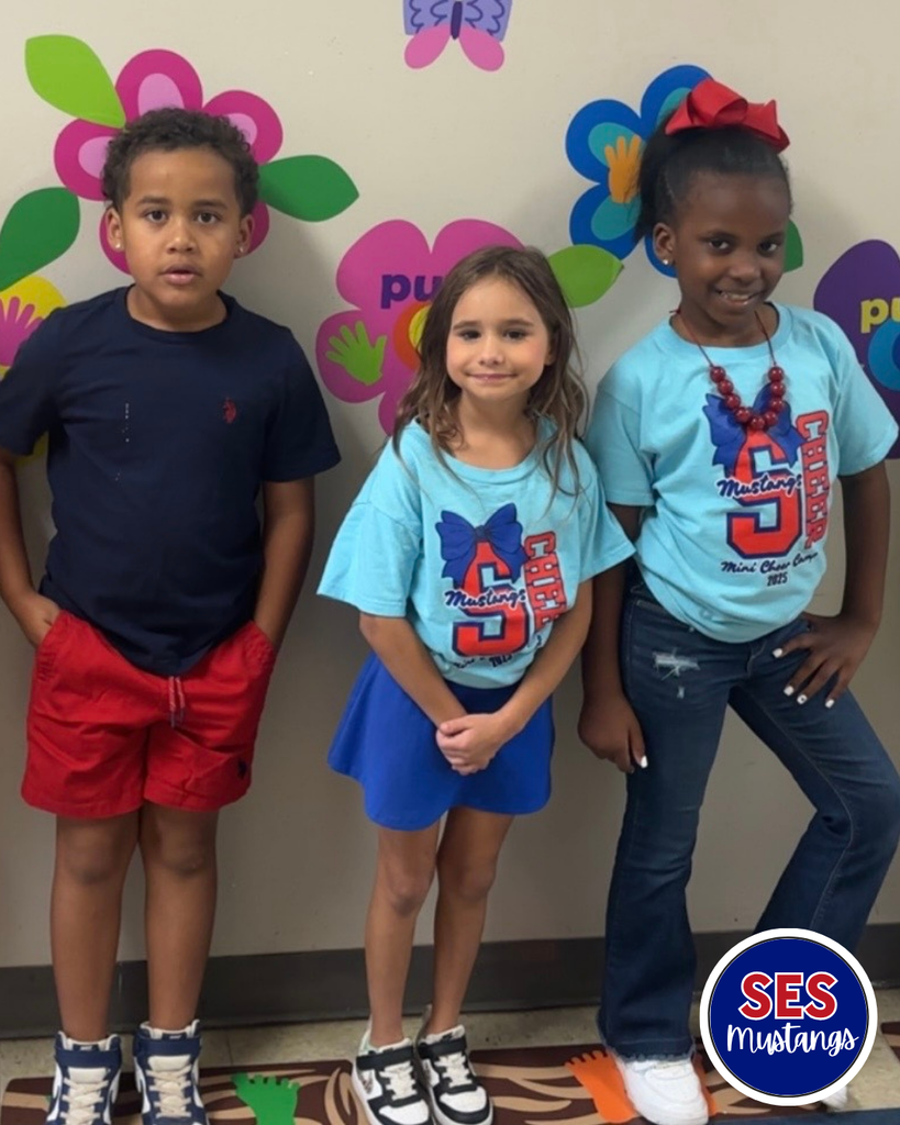 students smiling at camera