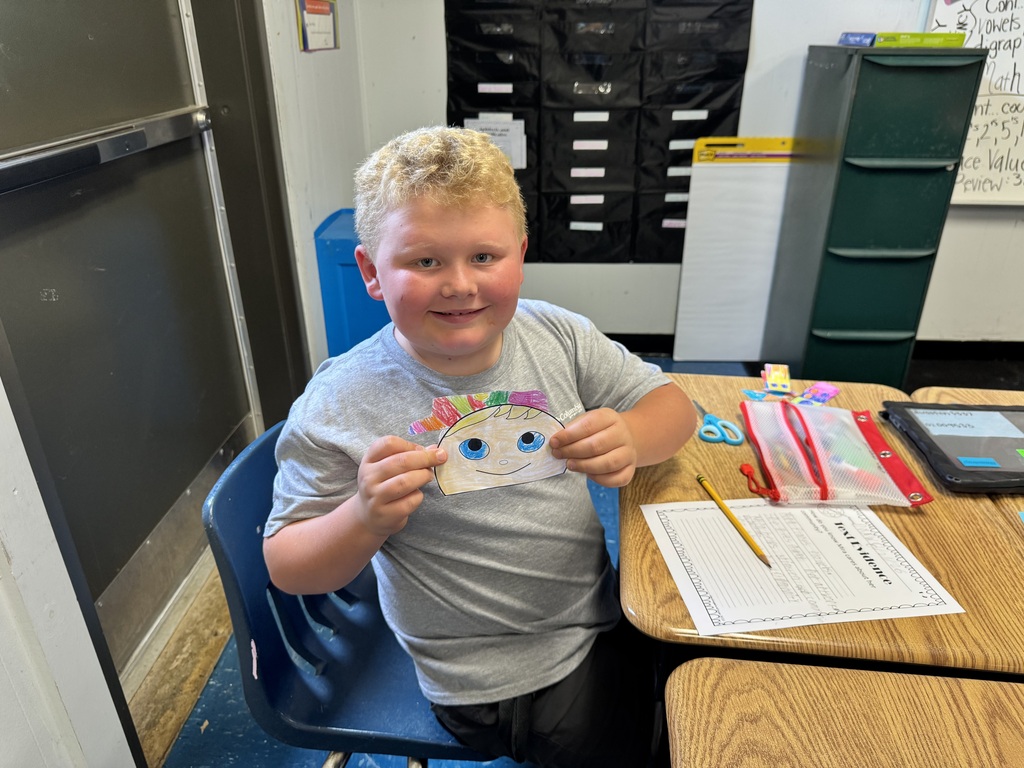 student smiling at camera