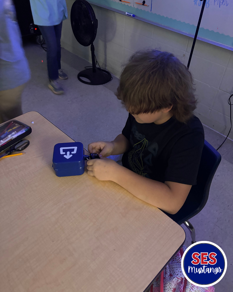 student at table