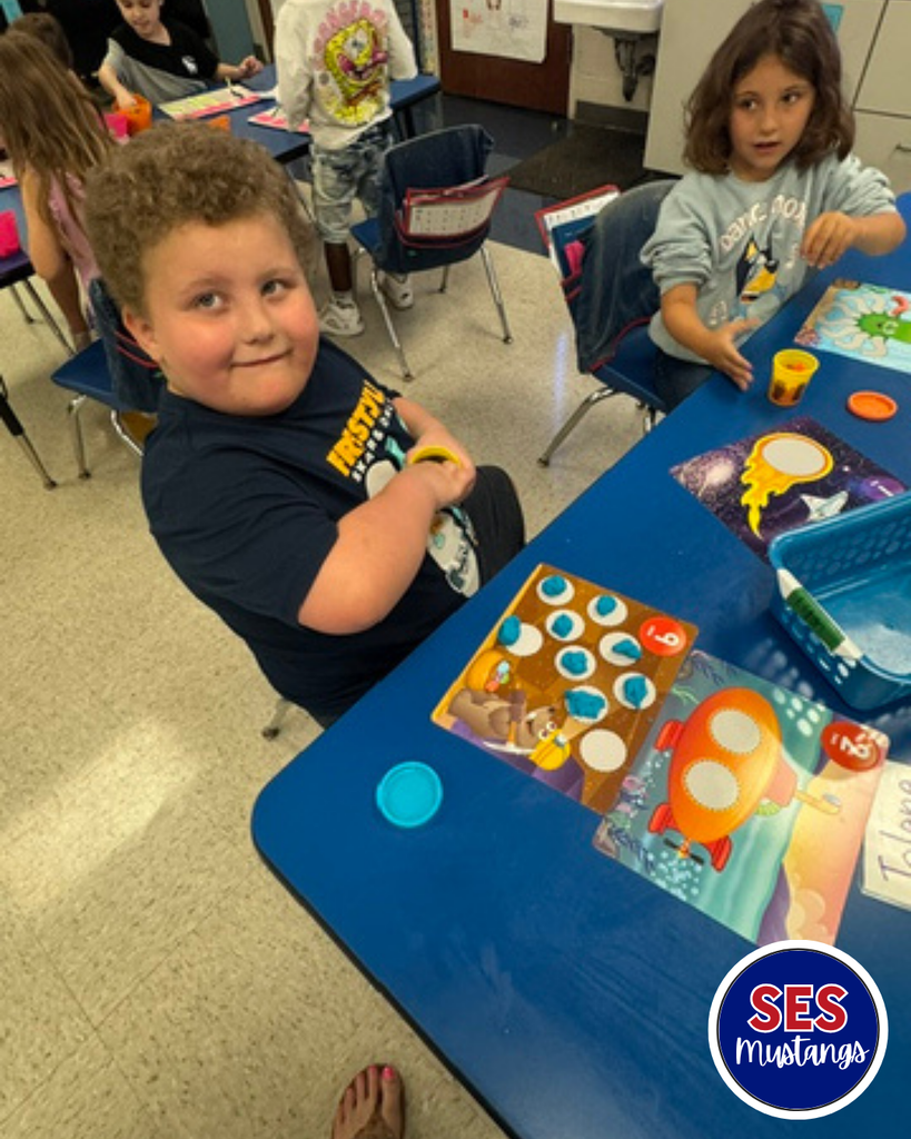 students with playdough