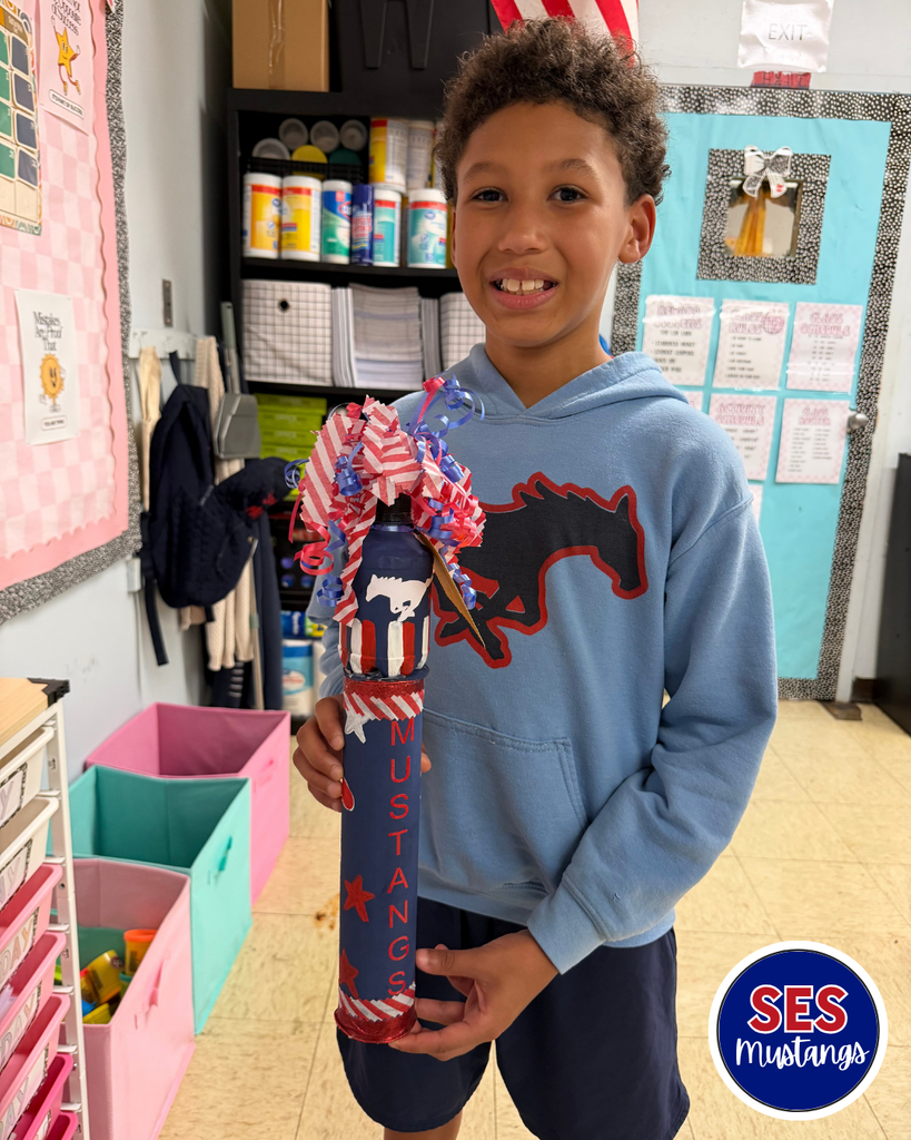 boy holding a spirit stick