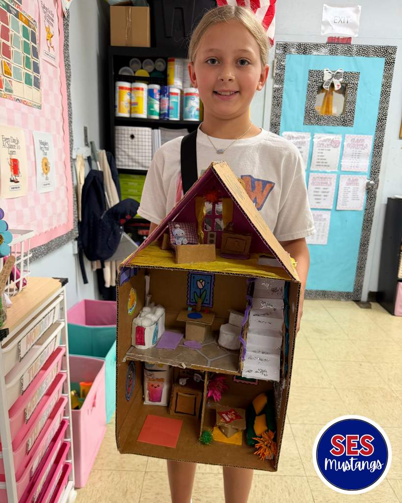 girl with cardboard house