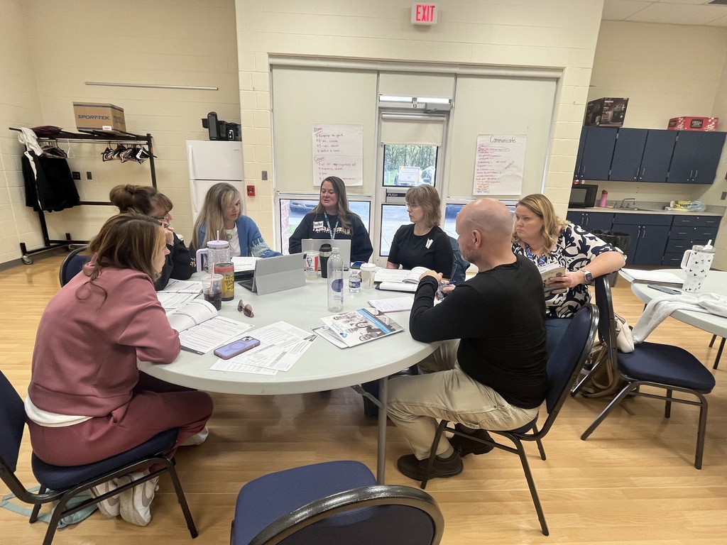Staff discussing ideas