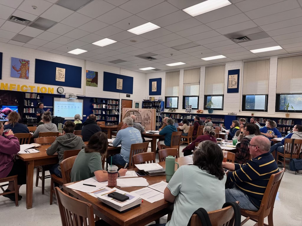 Staff learning about online grading