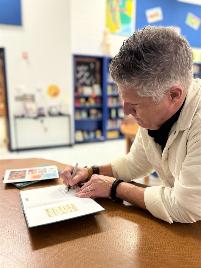 Author presentation to students in library
