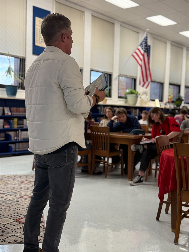 Author presentation to students in library