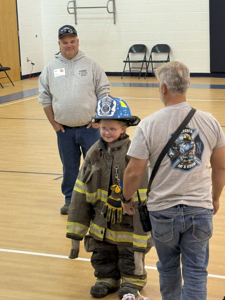 Student in firefighter gear
