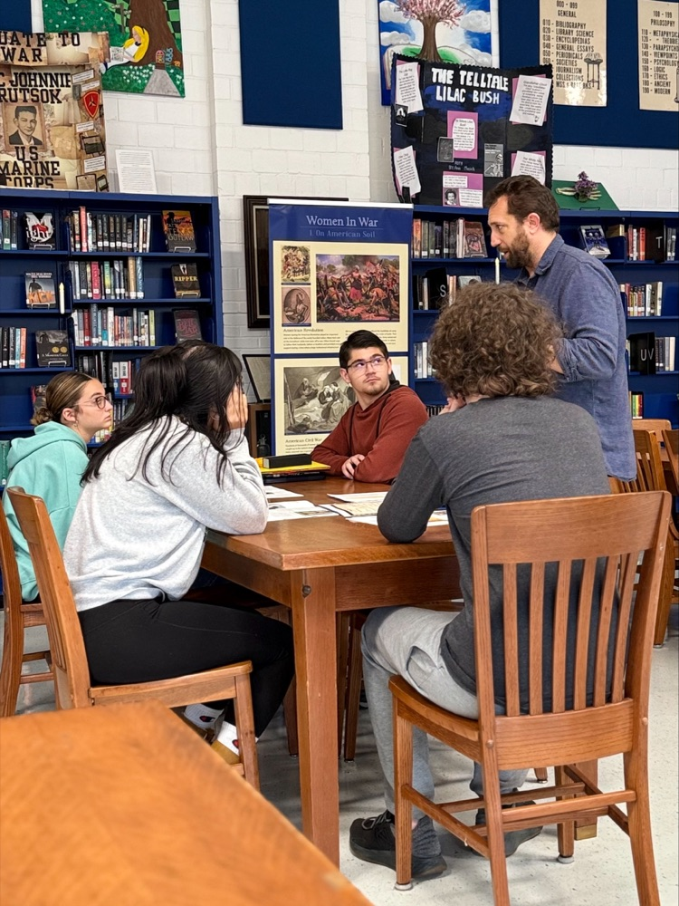 Library Students meeting with researchers 