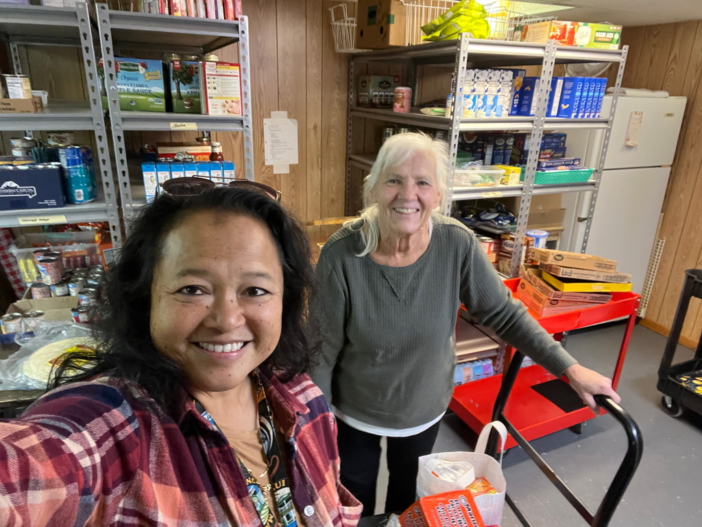 Taylor County Schools representatives providing donated food to local food banks