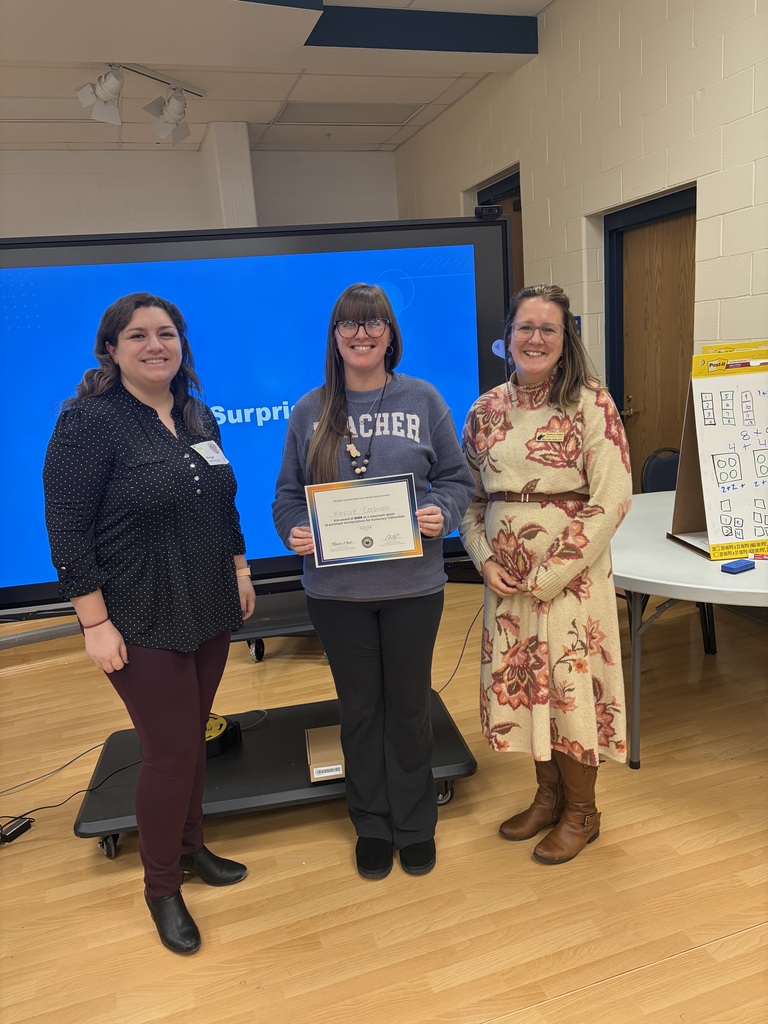 A teacher presented an award to support her math instruction