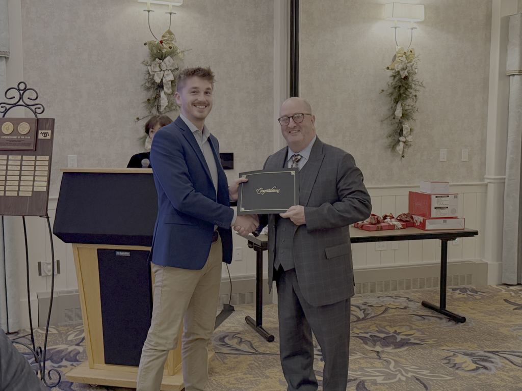 Dawson Evans accepting his 2025 WVASA Memorial Scholarship from Dr. Campbell.