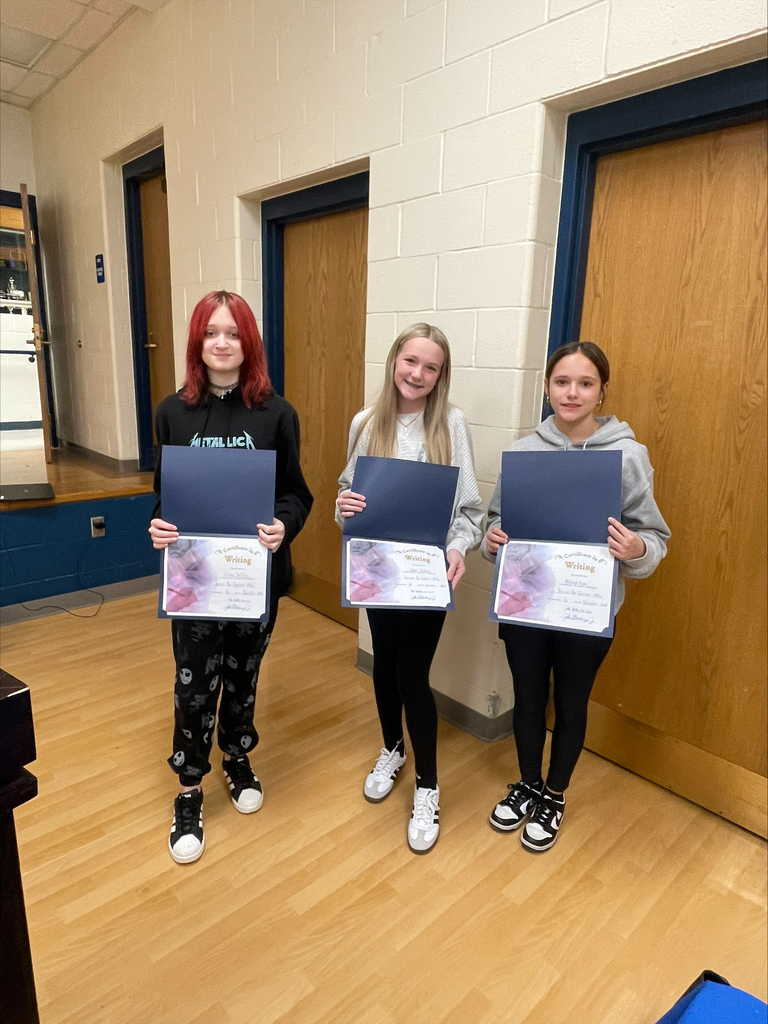 3 Patriot's Pen essay contest winners holding certificates