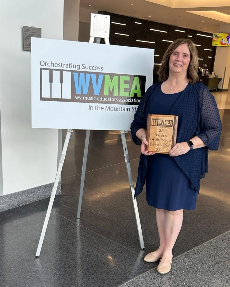 congratulations to Mrs. Mayle for 25 years of service in Music Education! 