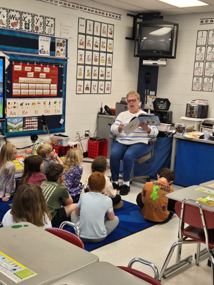 Wynne Proudfoot reading a book to Mrs. Noble’s class today.