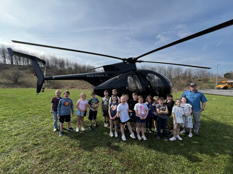 Justin Prickett with his helicopter