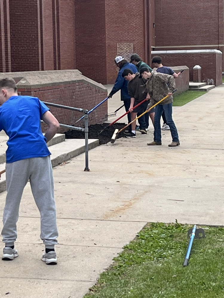 Bearcats at work! GHS Students mulching the front of the school