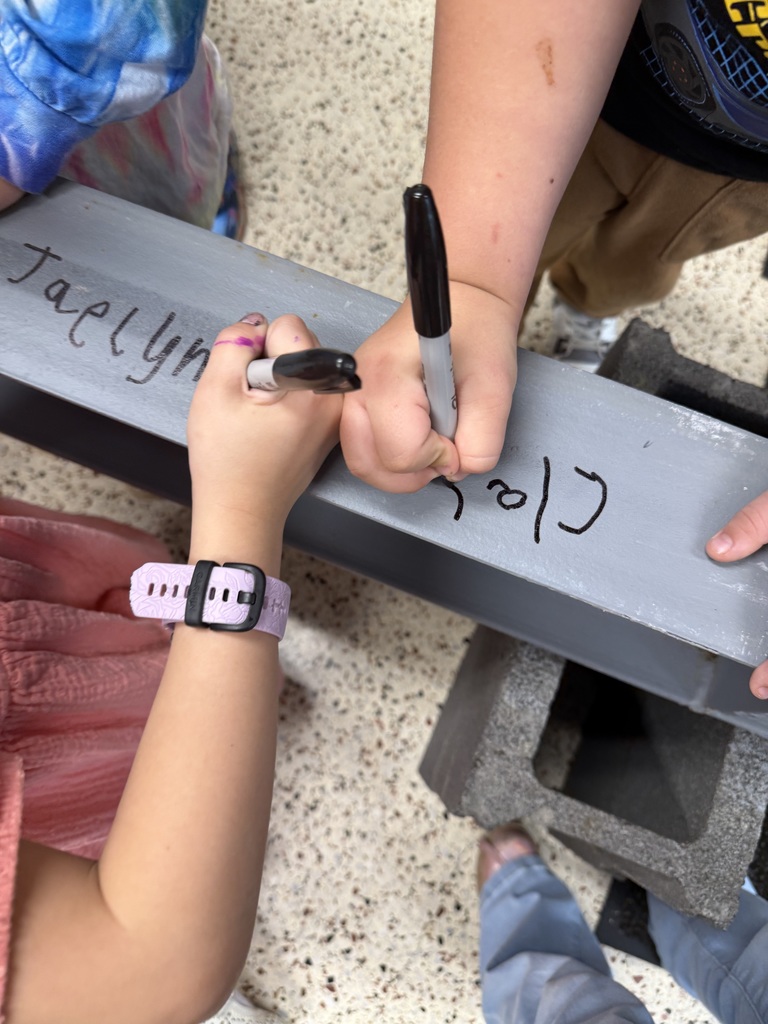 Students signing I-beam.