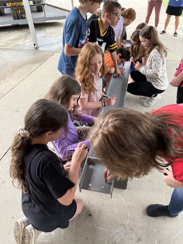 Students signing I-beam .
