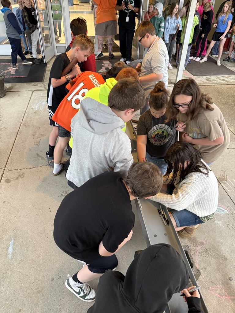 Students signing I-beam.