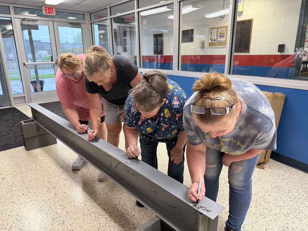 Cafeteria staff signing.