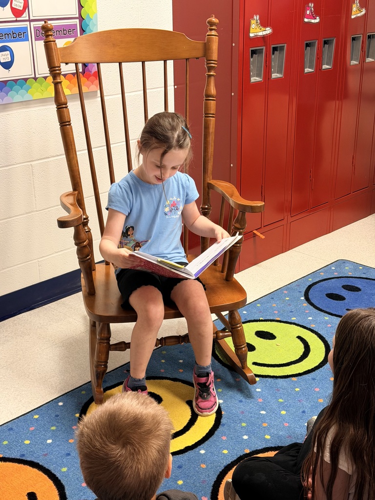 Ripley reading her story to the class.