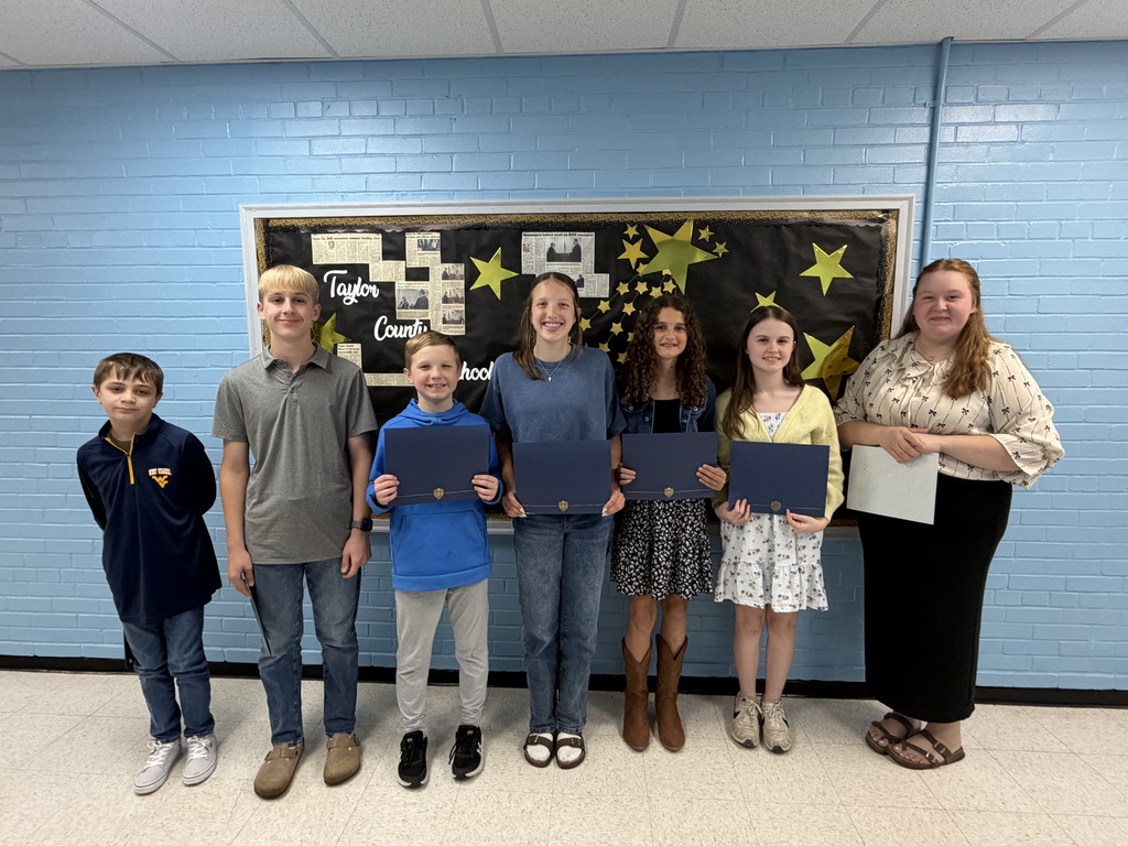group of students holding their certificates