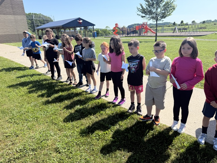 Students with their paper rockets