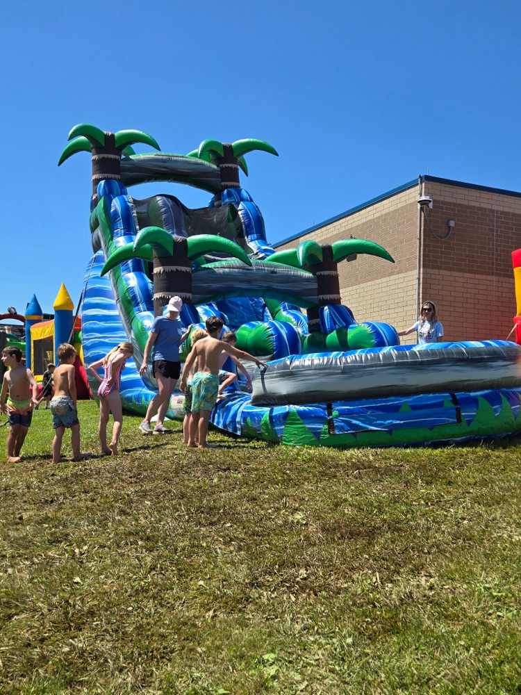 Students going on a water slide 