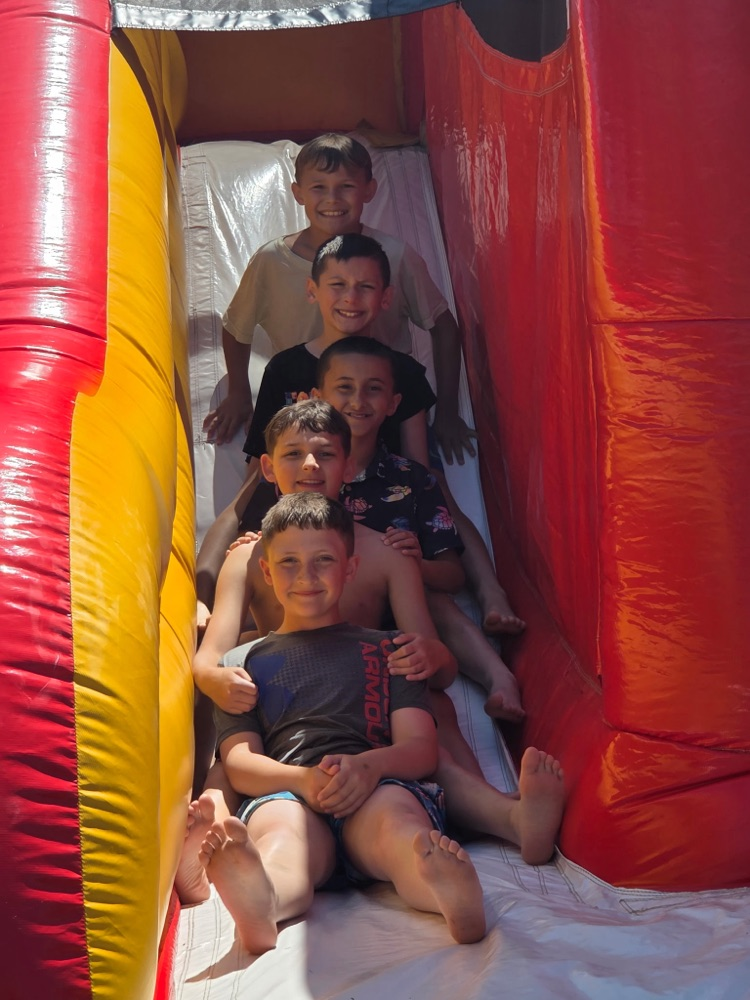 4th grade boys on a slide