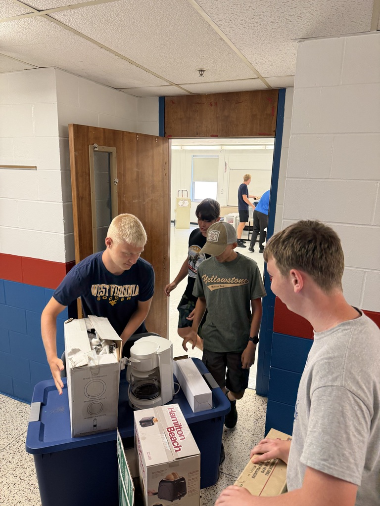 The boys moving lots of supplies.