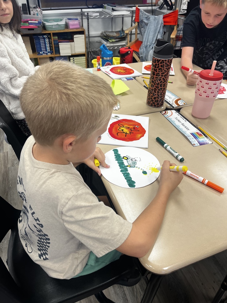 Students design dot pictures.