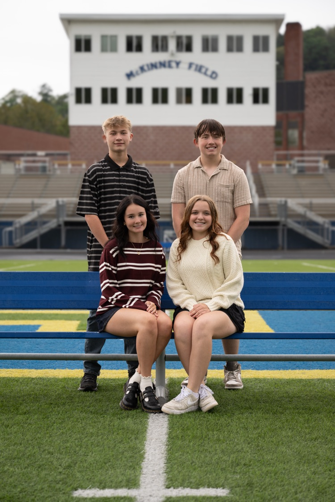Photograph on McKinney field of the sophomore Class princesses and their escorts