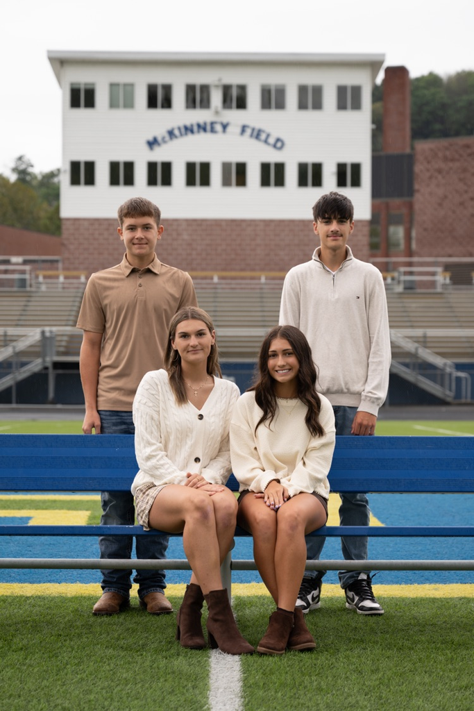 Photograph on McKinney field of the Freshman Class princesses and their escorts