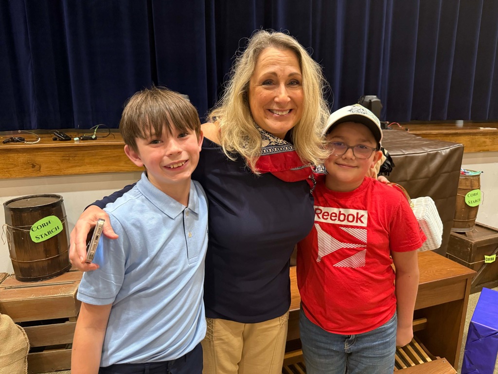 Easton Cook,  Mrs. Anna Luttrell, and Levi Deel.  Easton and Levi placed 2nd with their group exhibit.