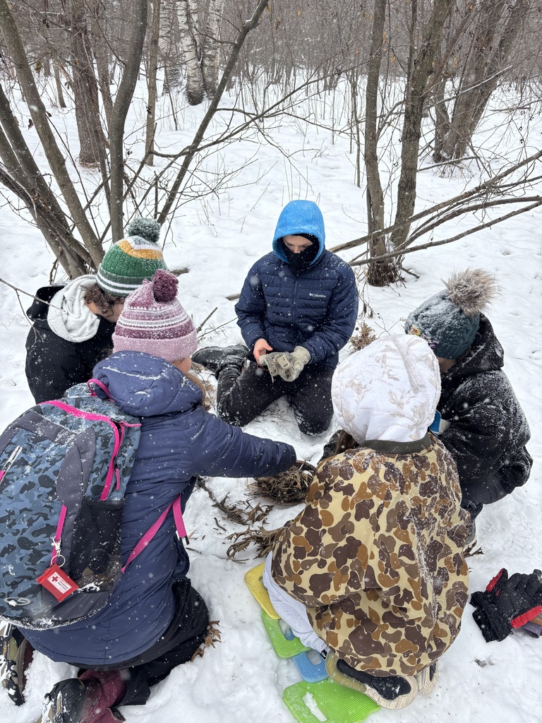 Terra Nova students tying to build a fire 