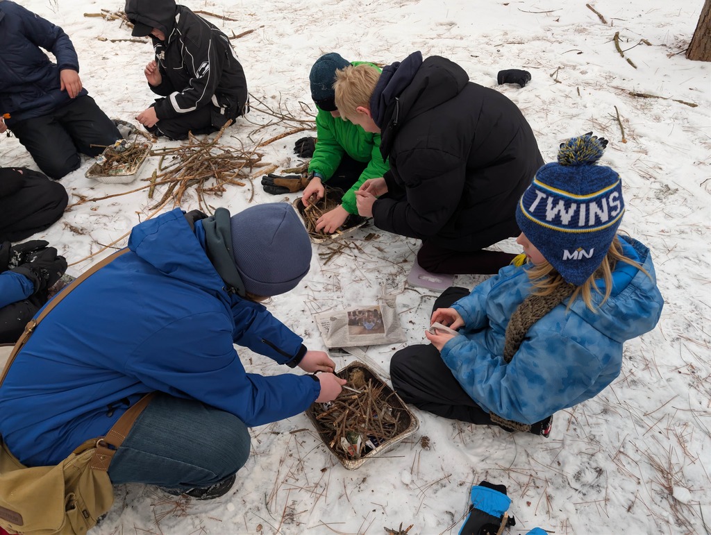 Terra Nova students trying to build a fire