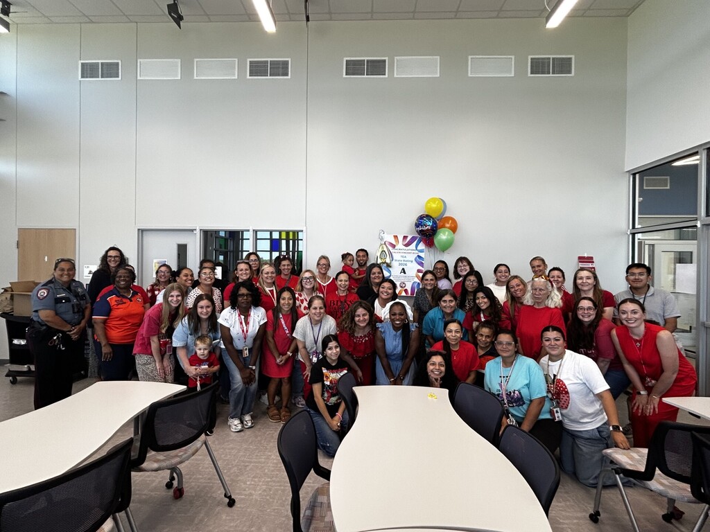 Campus group photo celebrating TEA designation at Calvin Vincent