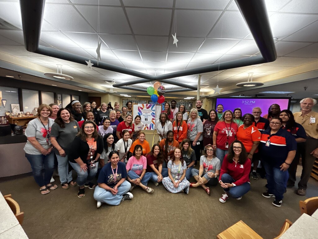 Roosevelt-Wilson group photo celebrating TEA B rating