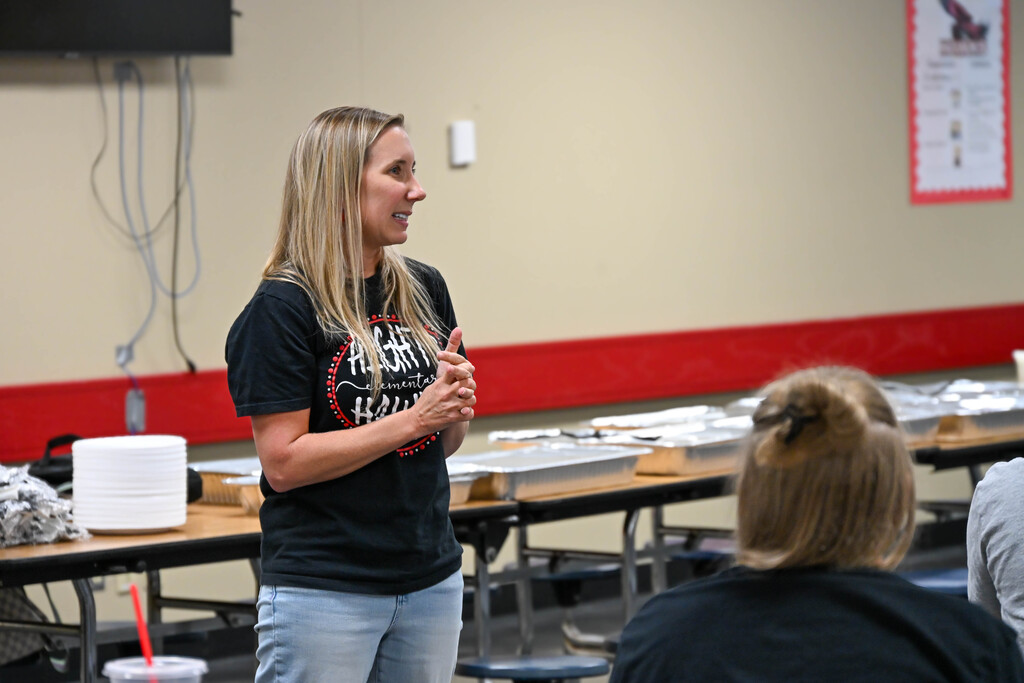 Heights Elementary principal speaks to colleagues during the school’s Lone Star Ribbon School celebration.