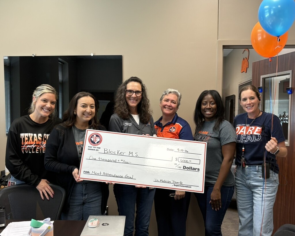 Blocker Middle School staff celebrate meeting their attendance goal