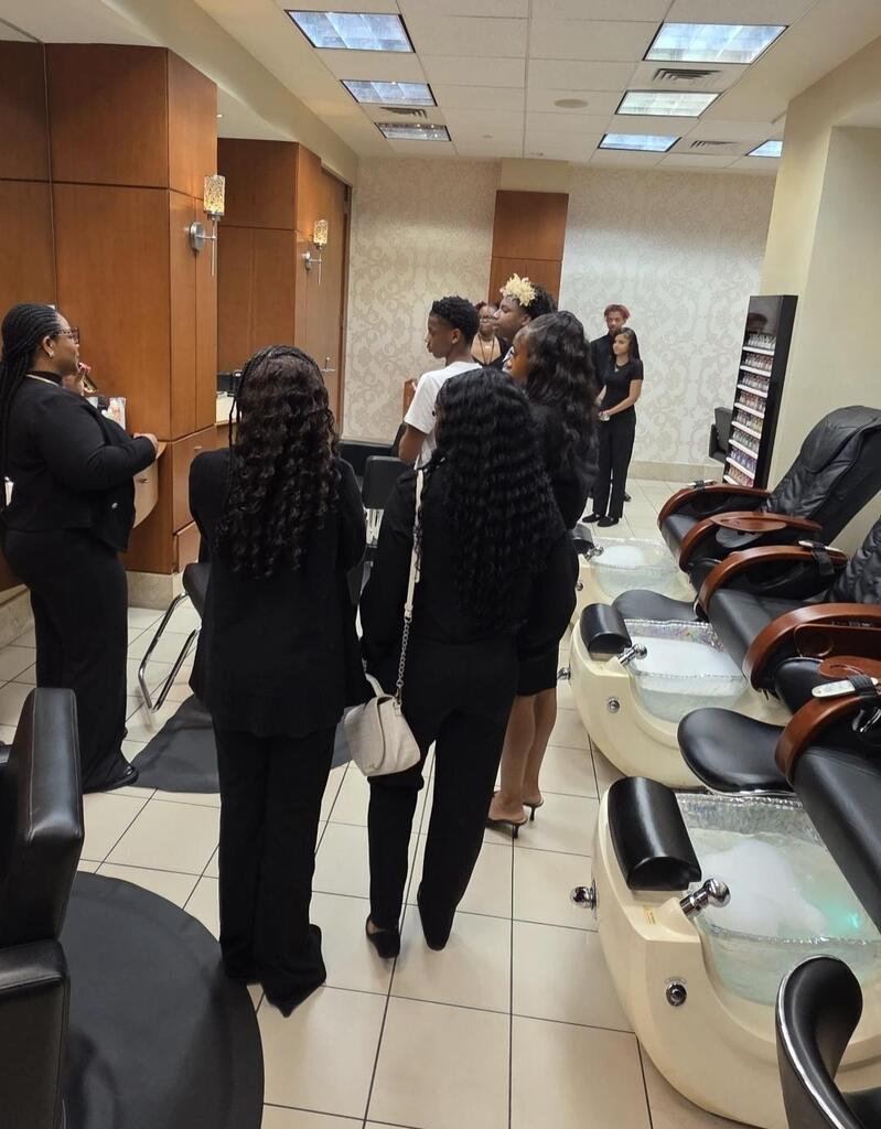 LMHS and TCHS cosmetology and barbering students get a tour through Moody Gardens Salon and Spa.