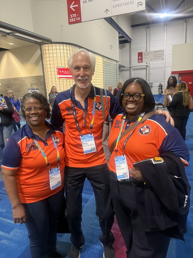 Three school board members at a conference in Houston